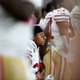 Eric Reid of the San Francisco 49ers kneels dugout the national anthem before the preseason game against the Minnesota Vikings on Aug. 27, 2017, at U.S. Bank Stadium in Minneapolis. (Hannah Foslien/Getty Images)